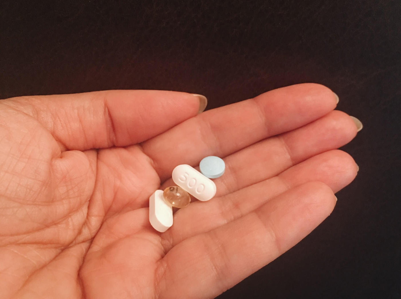 What are Active Ingredients in Medications? 1 Person holding a few generic brand medications in their hand